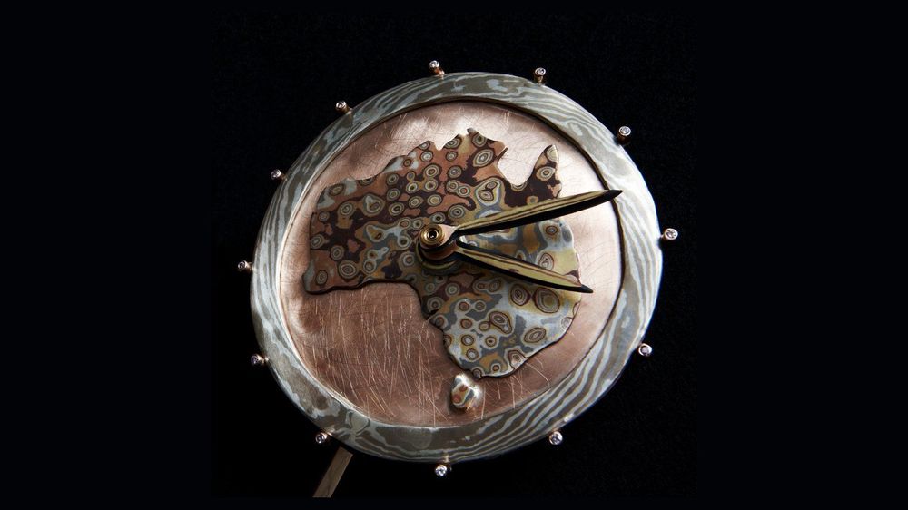 The Always Clock's face: Australia in Mokume Gane on a copper dial