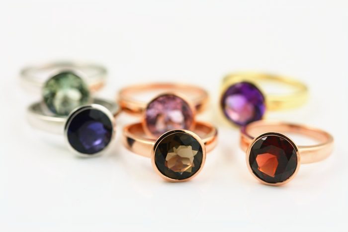 Tourmaline, Garnet and Amethyst stacking rings: Tourmaline, Garnet and Amethyst set in 18 karat gold