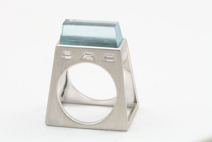 Aquamarine block ring: an Aquamarine with diamonds in 18 karat white gold