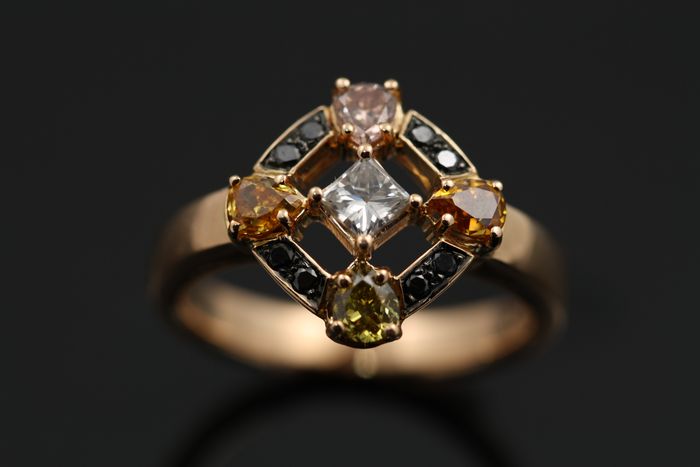 Fancy diamond cluster: an assortment of fancy coloured diamonds in 18 karat rose gold
