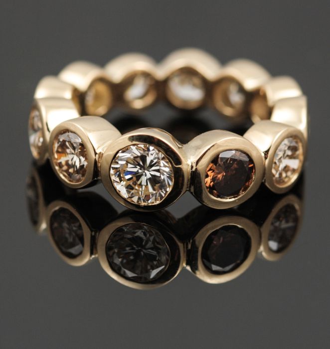 Champagne diamond eternity ring: champagne diamonds set in 18 karat rose gold
