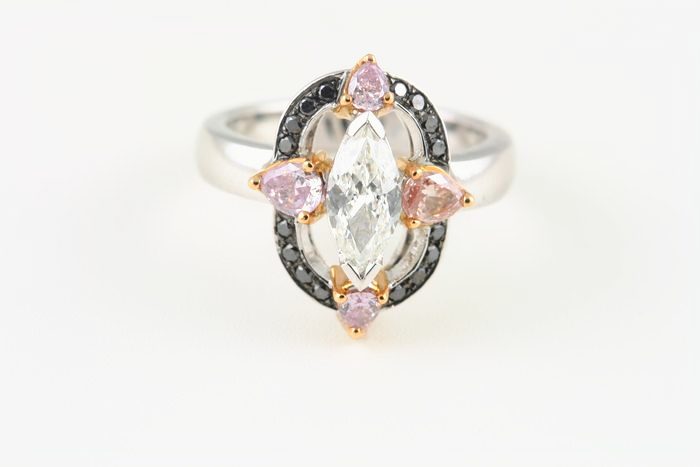 Diamond marquise halo ring: a diamond with black diamonds and pink Sapphires in 18 karat white gold