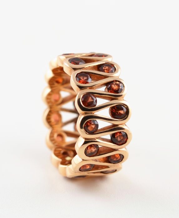 Garnet wave band: Garnets set in 18 karat rose gold