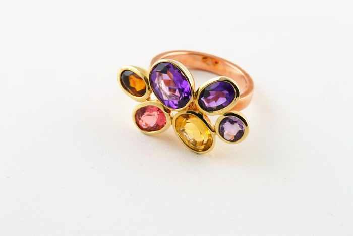 Confetti cluster ring: Amethyst, Iolite, Citrine and pink Tourmaline set in 18 karat rose gold