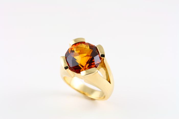 Citrine ring: a Citrine set in 18 karat yellow gold