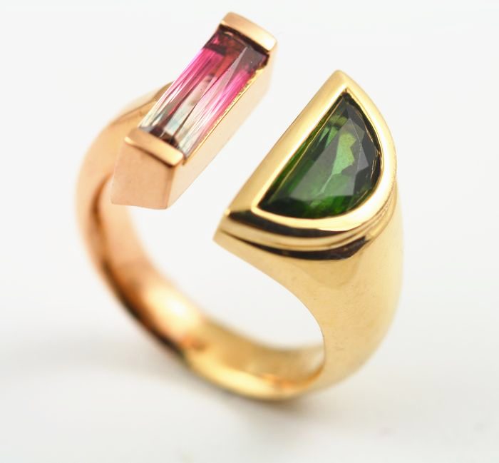 Tourmaline open ring: Tourmalines set in 18 karat yellow gold