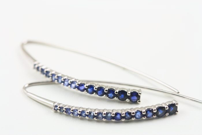 Blue Sapphire sweep earrings: blue Sapphires set in 18 karat white gold
