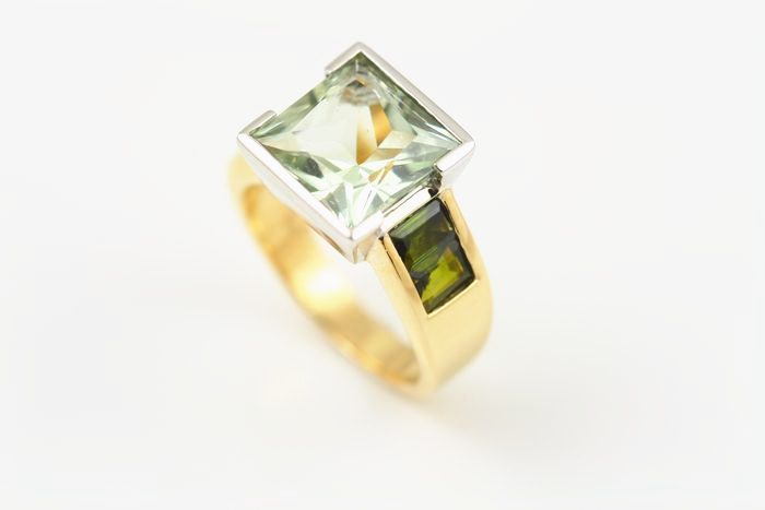 Green Amethyst square ring: a green Amethyst with green Tourmalines in 18 karat yellow and white gold
