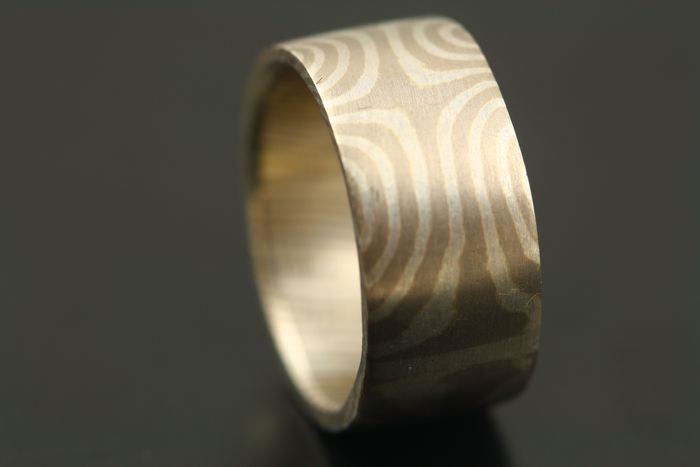 Wide Mokume Gane band: Mokume Gane, 18 karat white gold with silver