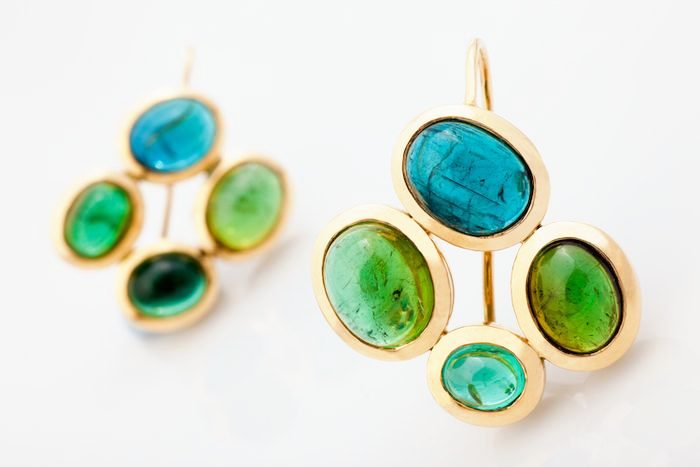 Tourmaline cabochon cluster earrings: Tourmaline cabochons set in 18 karat yellow gold