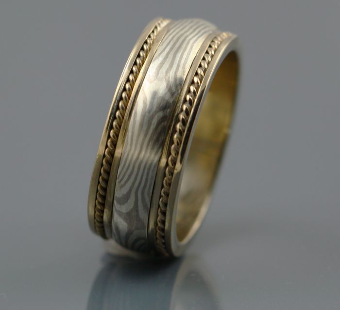 Rope-edge Mokume Gane band: a Mokume Gane band with 18 karat gold