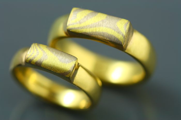 Mokume Gane and 22 karat gold rings: a pair of rings in Mokume Gane and 22 karat gold