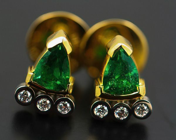 Emerald trillion studs: Emeralds and diamonds set in 18 karat yellow gold