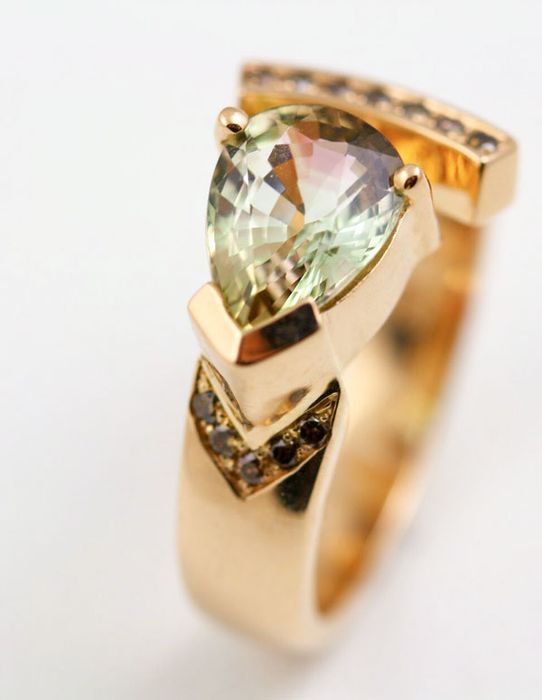 Mint Tourmaline trillion ring: a mint green Tourmaline with cognac diamonds in 18 karat rose gold