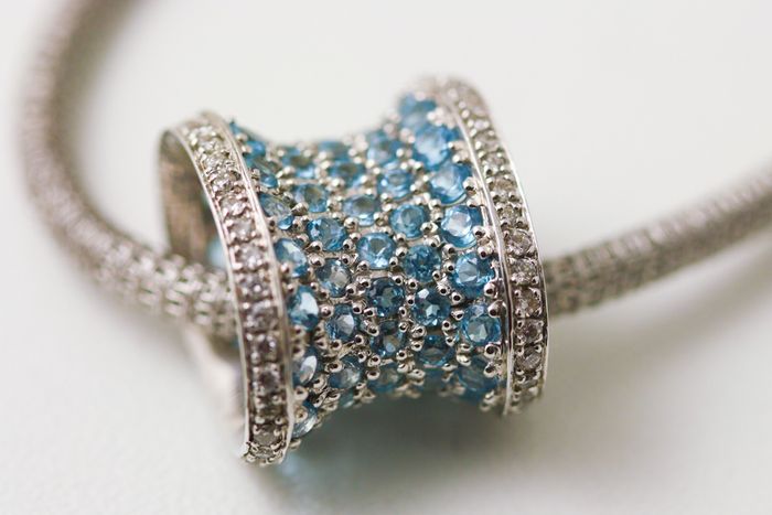 Topaz barrel pendant: a blue Topaz with diamonds in 18 karat white gold