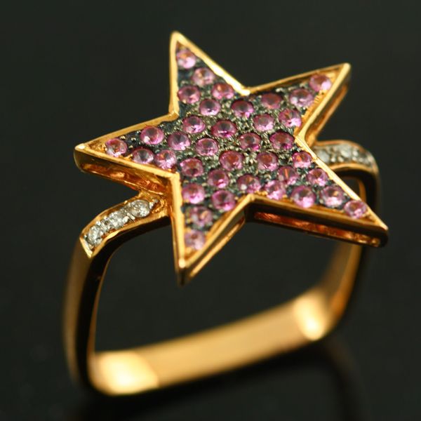Sapphire star ring: pink Sapphires and diamonds set in 18 karat rose gold