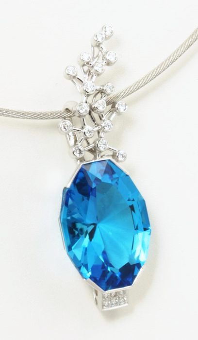 Topaz marquise pendant: a blue Topaz with diamonds in 18 karat white gold