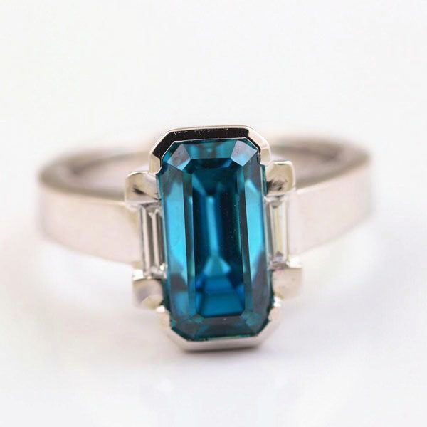 London Blue Topaz and diamond ring: a London Blue Topaz with diamonds in 18 karat white gold