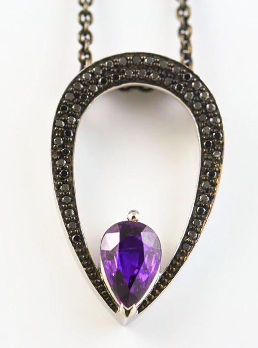 Amethyst pear pendant: an Amethyst with black diamonds in 18 karat white gold