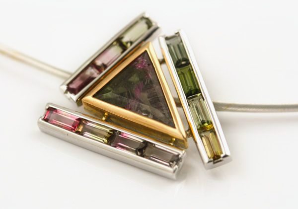 Tourmaline triangle pendant: Tourmalines set in 18 karat gold