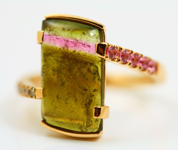 Tourmaline slice ring: a Tourmaline slice with pink Sapphires in 18 karat rose gold