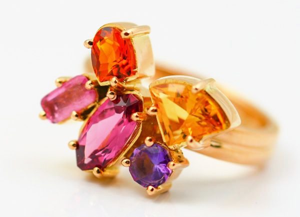 Sorbet cluster ring: pink Tourmalines, Citrines and an Amethyst set in 18 karat yellow gold