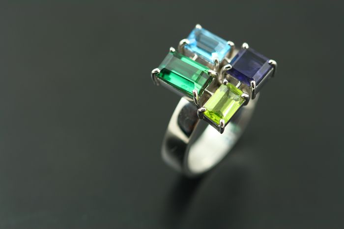 Baguette cluster: Tourmaline, Topaz, Iolite and Peridot set in 18 karat white gold