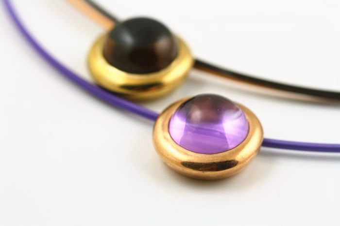 Smoky Quartz twin pendant: a Smoky Quartz with Amethyst in 18 karat gold