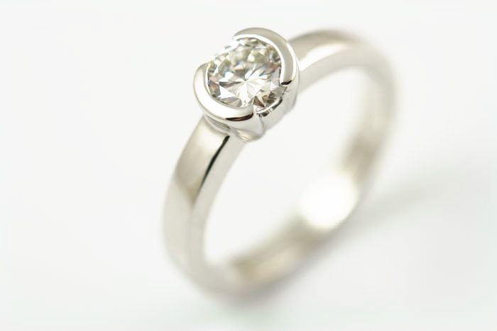 Diamond solitaire: a diamond set in 18 karat white gold