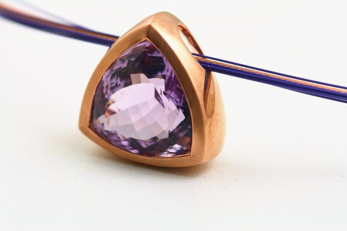 Amethyst trillion pendant: an Amethyst set in 18 karat rose gold